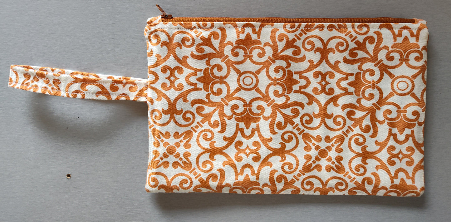 Orange-Paisley Geo Zippered Pouch Wristlet