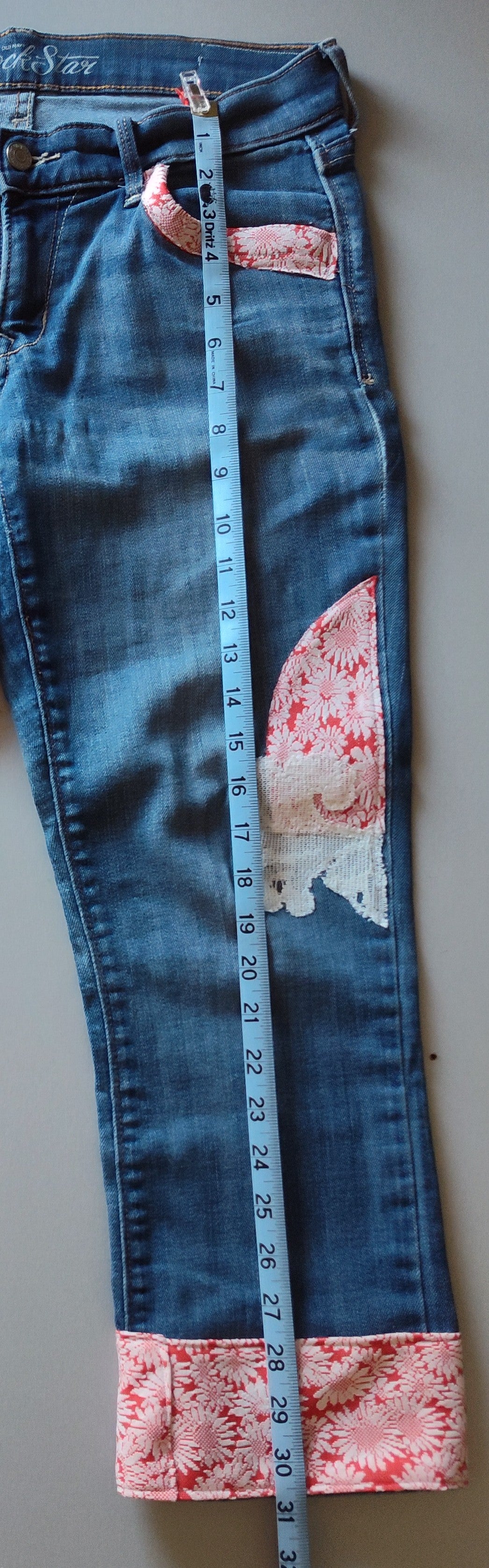 red flower jeans, knit sunflower print with lace, cropped jeans, front, leg, tape measure, size 12