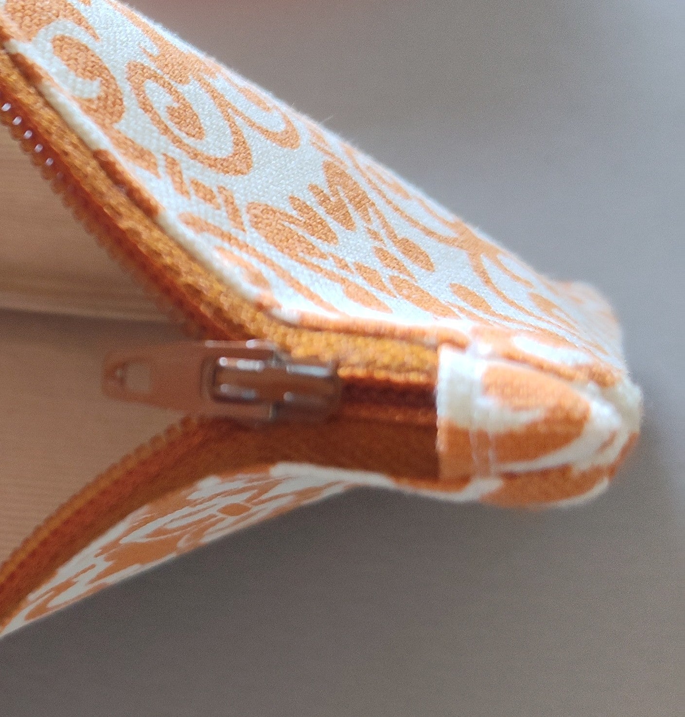 Orange-Paisley Geo Zippered Pouch Wristlet