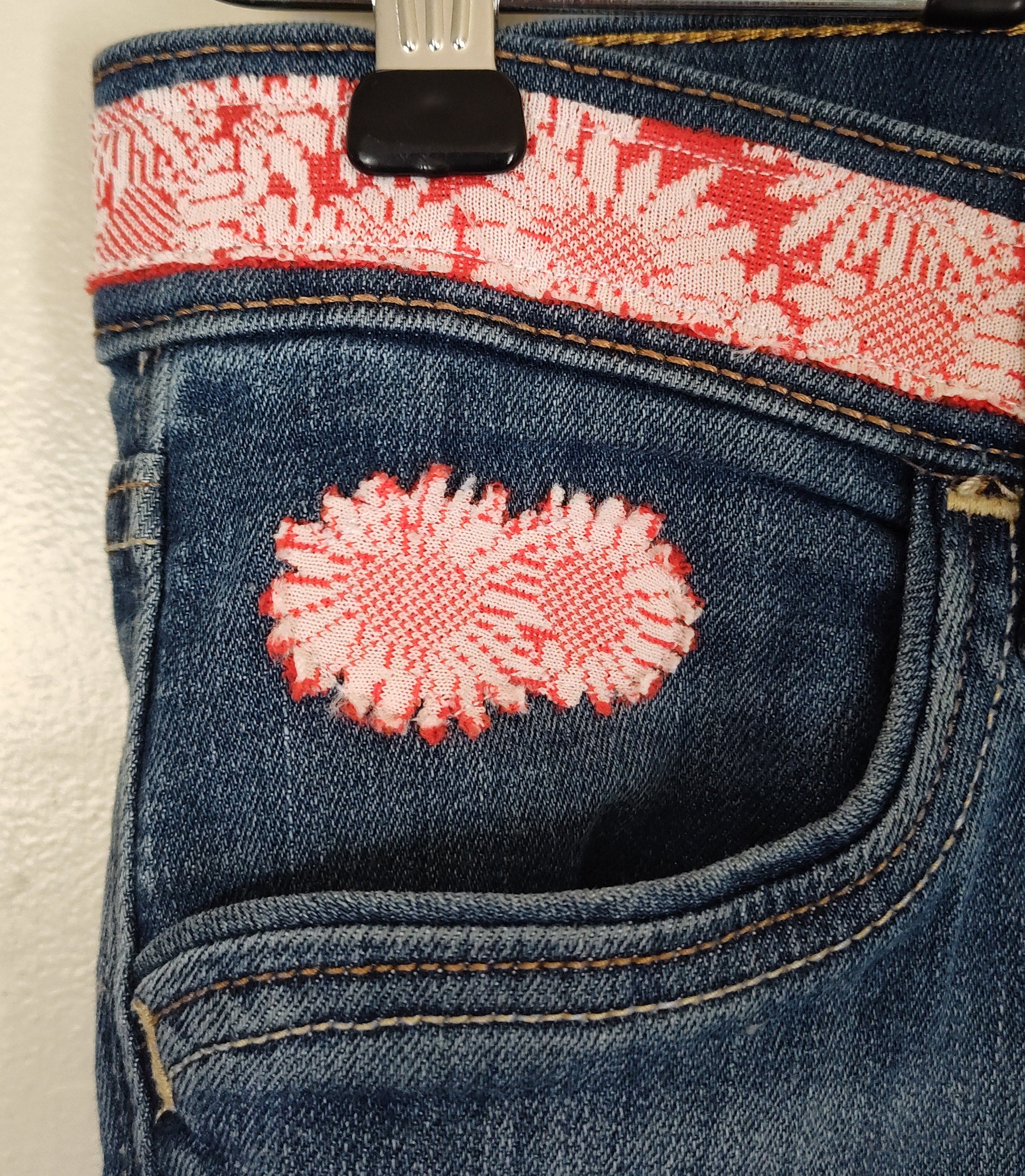 red flower jeans, knit sunflower print with lace, cropped jeans, front right pocket waist detail, size 12
